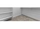 Walk-in closet featuring shelves and carpeted floor at 38709 N 16Th Pl, Phoenix, AZ 85086