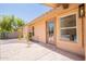 Exterior view of a home's covered back patio with desert landscaping at 4037 E Milton Dr, Cave Creek, AZ 85331