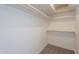 Bright and spacious walk-in closet with plenty of storage space on the shelving at 4037 E Milton Dr, Cave Creek, AZ 85331