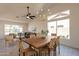 Bright dining room with a large table, stylish chairs, and an open layout at 4037 E Milton Dr, Cave Creek, AZ 85331