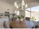 Bright kitchen with white cabinets, modern stainless steel appliances and view to the backyard at 4037 E Milton Dr, Cave Creek, AZ 85331