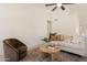 Inviting living room features a plush sofa, cozy chair and stylish decor at 4037 E Milton Dr, Cave Creek, AZ 85331