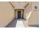 Front entrance with desert landscaping and a decorative welcome sign on the front door at 4093 E Westchester Dr, Chandler, AZ 85249