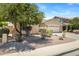 Charming one-story home with mature trees and desert landscaping at 4093 E Westchester Dr, Chandler, AZ 85249