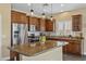 Well-equipped kitchen featuring an island, stainless steel appliances, and pendant lighting at 4093 E Westchester Dr, Chandler, AZ 85249