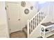 Staircase with carpet and a decorative table at 44583 W Sandstone Dr, Maricopa, AZ 85139