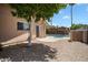 Backyard featuring a pool and a covered patio, perfect for outdoor entertaining and relaxation at 5227 W Acapulco Ln, Glendale, AZ 85306