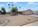Cozy single story home with low maintenance landscaping, screened in porch, and a two car garage at 5227 W Acapulco Ln, Glendale, AZ 85306