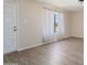 Comfortable living room with neutral walls and hard surface floors at 5227 W Acapulco Ln, Glendale, AZ 85306
