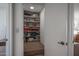 Linen closet with multiple shelves that are holding many towels, sheets, and other folded goods at 5596 W Mercer Ln, Glendale, AZ 85304
