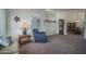 Comfortable living room showcasing neutral carpet, cozy furniture, and decor at 5596 W Mercer Ln, Glendale, AZ 85304