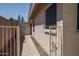 Paved side yard with gate and storage shed at 5596 W Mercer Ln, Glendale, AZ 85304