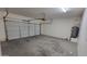 Garage with garage door, water heater and plenty of space at 6908 S 54Th Ln, Laveen, AZ 85339