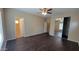 Spacious main bedroom featuring a ceiling fan and a large closet for ample storage space at 6908 S 54Th Ln, Laveen, AZ 85339
