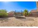 This backyard area offers a trampoline surrounded by low-maintenance landscaping at 7310 N 68Th Ln, Glendale, AZ 85303