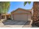 Lovely single-story home featuring a two-car garage and xeriscaped front yard for easy care and water conservation at 7310 N 68Th Ln, Glendale, AZ 85303