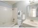 Cozy bathroom with a shower-tub combo, vanity, and well-lit mirror for convenience at 742 S Rose --, Mesa, AZ 85204