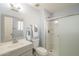 Updated bathroom with a modern vanity, toilet, and sliding glass door shower at 742 S Rose --, Mesa, AZ 85204