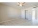This bedroom provides ample closet space, ceiling fan, and neutral paint at 742 S Rose --, Mesa, AZ 85204