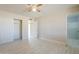 Bright bedroom with modern flooring, closet, and ensuite bathroom offers comfort and style at 742 S Rose --, Mesa, AZ 85204