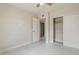 Bedroom with a ceiling fan and a closet with sliding doors, offering ample storage space at 742 S Rose --, Mesa, AZ 85204