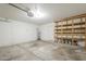 Spacious garage with shelving and overhead door at 742 S Rose --, Mesa, AZ 85204