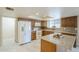 Bright kitchen with stainless steel appliances, granite countertops, and center island at 742 S Rose --, Mesa, AZ 85204