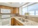 Modern kitchen showcasing granite countertops, tile backsplash, and stainless steel appliances at 742 S Rose --, Mesa, AZ 85204