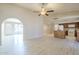 Inviting living room area with tile flooring and a seamless transition to the adjacent kitchen at 742 S Rose --, Mesa, AZ 85204