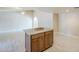Open-concept living room featuring a decorative island and archway at 742 S Rose --, Mesa, AZ 85204