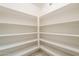 Walk-in pantry with lots of shelving, and light flooring at 742 S Rose --, Mesa, AZ 85204