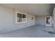 Covered patio with a side door and multiple windows at 742 S Rose --, Mesa, AZ 85204