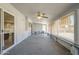 Bright sunroom with sliding glass door and seating area, ideal for enjoying natural light and views at 742 S Rose --, Mesa, AZ 85204