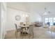 Open concept dining area with views of the living room and abundant natural light at 8541 W Sierra Vista Dr, Glendale, AZ 85305