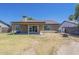 Charming single-story home features a covered patio and well-maintained lawn at 8541 W Sierra Vista Dr, Glendale, AZ 85305