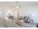 Open concept living and dining area with ample seating and neutral décor at 8541 W Sierra Vista Dr, Glendale, AZ 85305