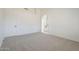 Large main bedroom featuring carpet flooring, ensuite bathroom, and neutral paint at 8541 W Sierra Vista Dr, Glendale, AZ 85305