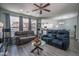 Open-concept living room and kitchen area, perfect for entertaining and Gathering gatherings at 8964 W Northview Ave, Glendale, AZ 85305