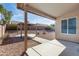 Charming covered patio overlooking a well-kept backyard with decorative gazebo at 909 E Harwell Rd, Phoenix, AZ 85042