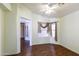 Dining area with hard wood floors with a view of another dining room at 909 E Harwell Rd, Phoenix, AZ 85042