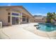 Beautiful backyard with a pool, mountain views and a covered patio for relaxing and entertaining at 10214 E Moonshadow Way, Gold Canyon, AZ 85118
