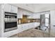 Beautiful kitchen with stainless steel appliances, granite countertops, and white cabinets at 10214 E Moonshadow Way, Gold Canyon, AZ 85118