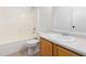 Bathroom featuring a shower-tub combo, toilet, sink, and a light-wood vanity at 10521 W Donald Dr, Peoria, AZ 85383