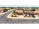 Charming home boasts mature trees, a two-car garage, and well-maintained landscaping at 10521 W Donald Dr, Peoria, AZ 85383