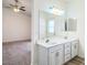 Bright bathroom features double sinks, vanity, and lots of storage at 10722 W Quartz Dr, Casa Grande, AZ 85193