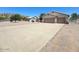 A charming home with a well-maintained driveway and a two-car garage at 10722 W Quartz Dr, Casa Grande, AZ 85193