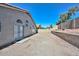 This backyard offers beautiful architecture, a large lot, and block walls for privacy at 11224 W Puget Ave, Peoria, AZ 85345