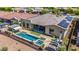 Spacious backyard features a pool, spa, covered patios, desert landscaping for luxurious living at 11796 W Creosote Dr, Peoria, AZ 85383