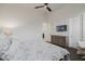 Bedroom with a dresser and television, offering a comfortable and functional space at 11796 W Creosote Dr, Peoria, AZ 85383