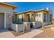 Exterior shot of desert home with stone accents, desert landscaping, and block wall at 11796 W Creosote Dr, Peoria, AZ 85383